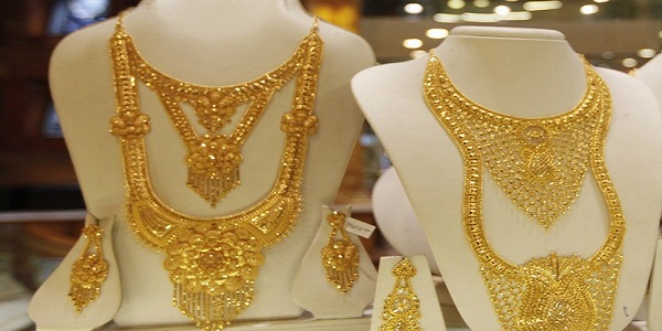 Amid Global Cues and Low Demand Gold Slips by Rs 100